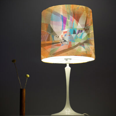 a vintage midcentury lamp from the 60s with a large brown lampsh